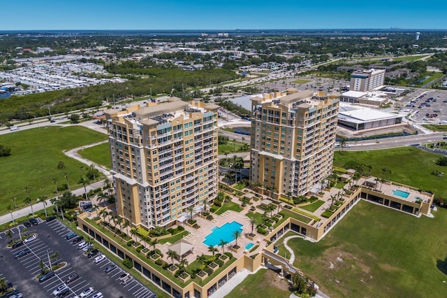 130 Riviera Dunes Way Unit 601, Palmetto, FL 34221 - view of urban area featuring a pool area and apartment complex