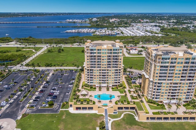 130 Riviera Dunes Way Unit 601, Palmetto, FL 34221 - aerial view of property and surrounding area featuring a pool area and a large body of water