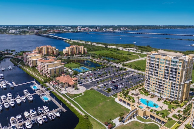 130 Riviera Dunes Way Unit 601, Palmetto, FL 34221 - drone / aerial view of a nearby body of water and a pool area