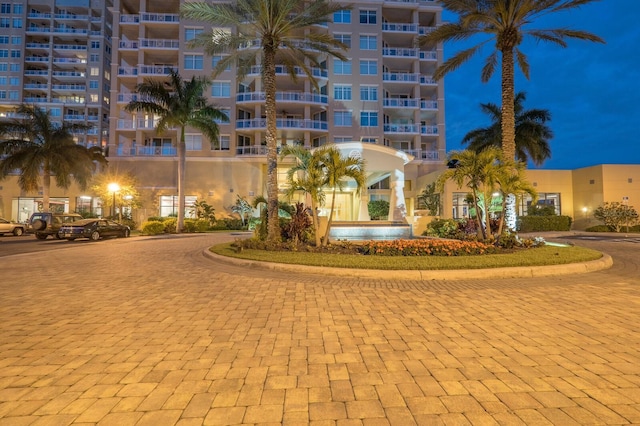 130 Riviera Dunes Way Unit 601, Palmetto, FL 34221 - property at twilight with a view of apartment building / complex