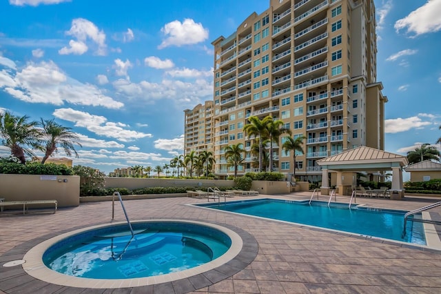 130 Riviera Dunes Way Unit 601, Palmetto, FL 34221 - community pool with a gazebo, a community hot tub, and a patio