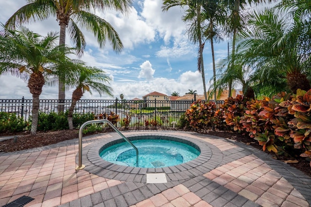 130 Riviera Dunes Way Unit 601, Palmetto, FL 34221 - view of swimming pool with a hot tub
