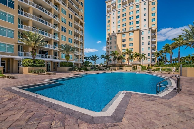 130 Riviera Dunes Way Unit 601, Palmetto, FL 34221 - community pool featuring a patio area