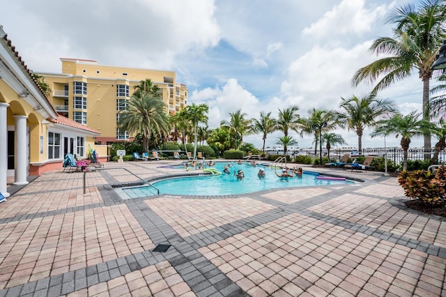 130 Riviera Dunes Way Unit 601, Palmetto, FL 34221 - community pool with a patio