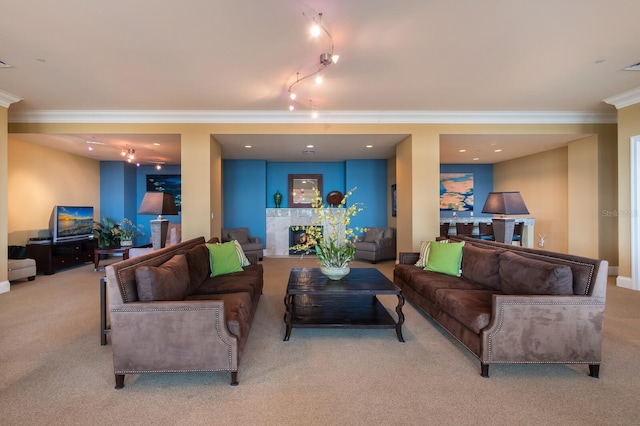 130 Riviera Dunes Way Unit 601, Palmetto, FL 34221 - carpeted living room featuring ornamental molding