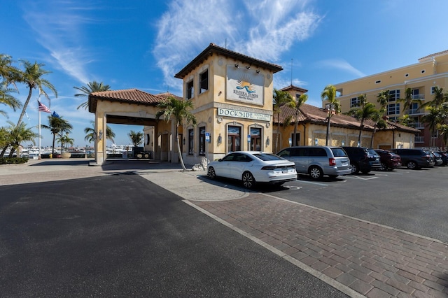 130 Riviera Dunes Way Unit 601, Palmetto, FL 34221 - view of building exterior with uncovered parking