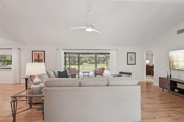 5283 Everwood Run, Sarasota, FL 34235 - living area with lofted ceiling, light wood-type flooring, and ceiling fan