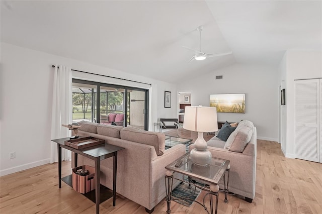 5283 Everwood Run, Sarasota, FL 34235 - living room with vaulted ceiling, ceiling fan, and light wood-type flooring