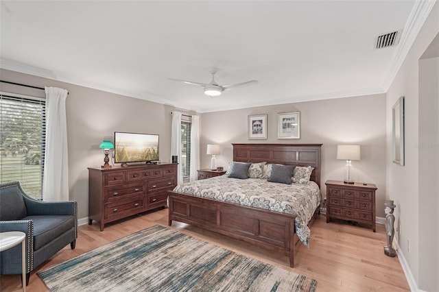 5283 Everwood Run, Sarasota, FL 34235 - bedroom featuring multiple windows, light wood finished floors, ornamental molding, and ceiling fan