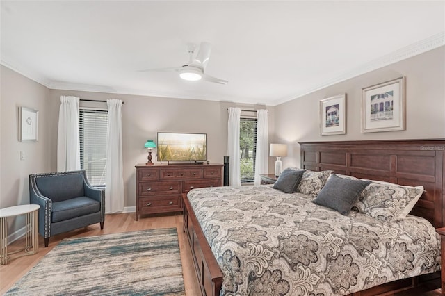 5283 Everwood Run, Sarasota, FL 34235 - bedroom featuring crown molding, light wood-type flooring, and a ceiling fan