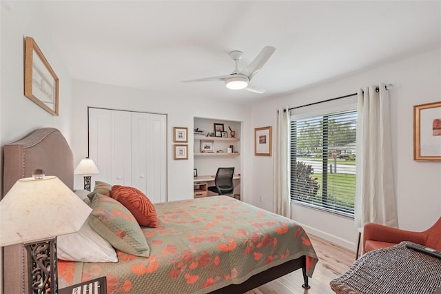 5283 Everwood Run, Sarasota, FL 34235 - bedroom with wood finished floors, a closet, and ceiling fan
