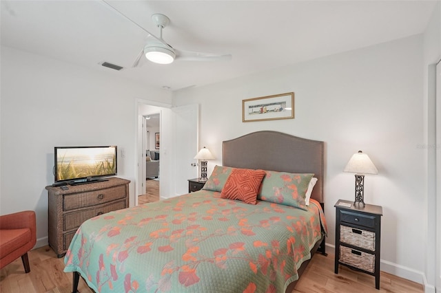 5283 Everwood Run, Sarasota, FL 34235 - bedroom with light wood-style flooring and a ceiling fan