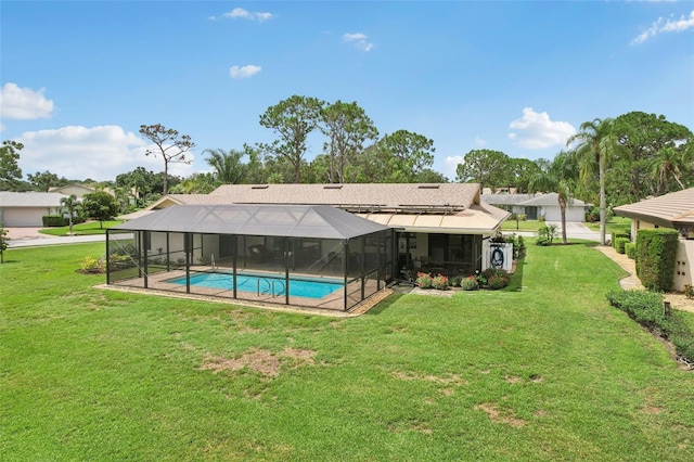 5283 Everwood Run, Sarasota, FL 34235 - rear view of property with an outdoor pool, a yard, a lanai, and a patio area