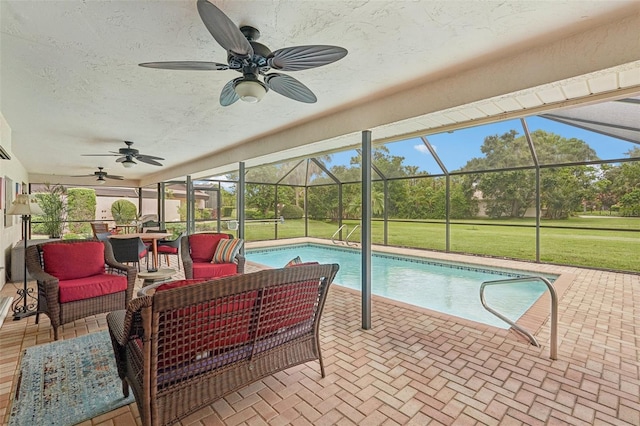5283 Everwood Run, Sarasota, FL 34235 - outdoor pool featuring ceiling fan, an outdoor living space, a patio, and a yard