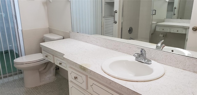 4640 Orlando Cir, Bradenton, FL 34207 - bathroom with an enclosed shower, vanity, and tile patterned flooring