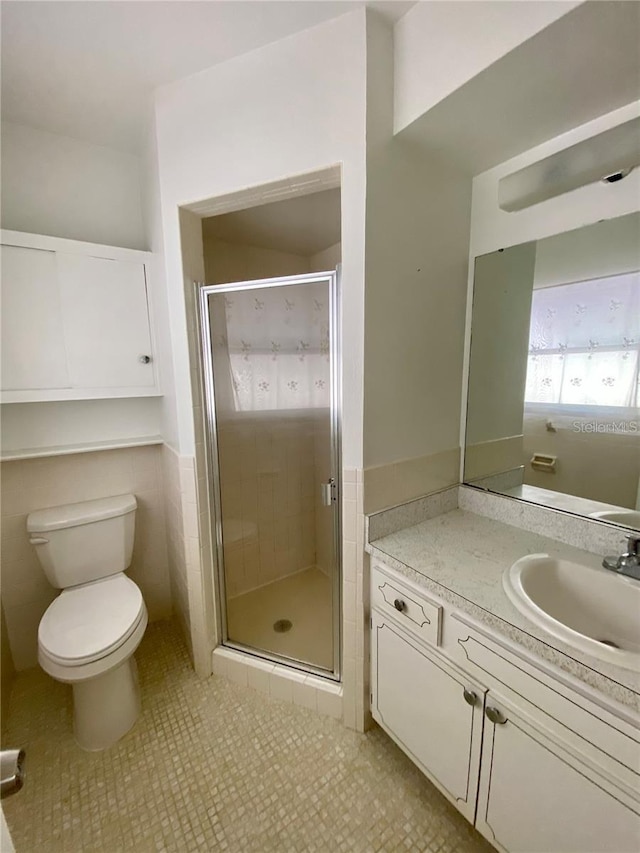 4640 Orlando Cir, Bradenton, FL 34207 - full bathroom featuring vanity, a shower stall, and tile patterned floors