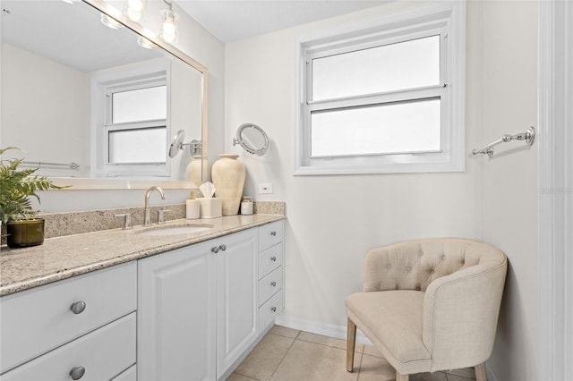 225 Sands Point Rd Unit 6103, Longboat Key, FL 34228 - bathroom featuring plenty of natural light, vanity, and tile patterned flooring