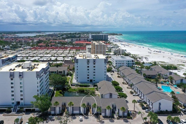 1036 W Peppertree Ln Unit 113B, Sarasota, FL 34242 - drone / aerial view of waterfront with a beach