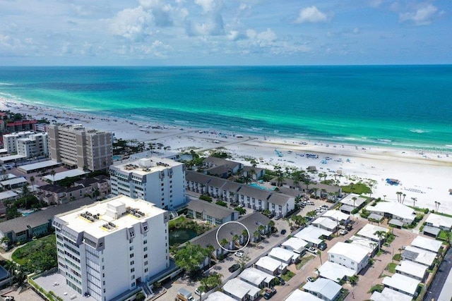 1036 W Peppertree Ln Unit 113B, Sarasota, FL 34242 - drone / aerial view of waterfront with a beach