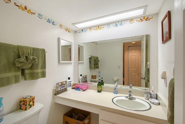 1036 W Peppertree Ln Unit 113B, Sarasota, FL 34242 - half bathroom with toilet and vanity