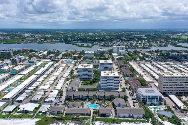 1036 W Peppertree Ln Unit 113B, Sarasota, FL 34242 - aerial view of a pool area and a large body of water