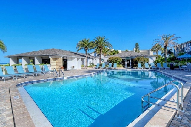 1036 W Peppertree Ln Unit 113B, Sarasota, FL 34242 - community pool featuring a patio area