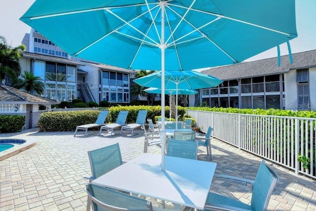 1036 W Peppertree Ln Unit 113B, Sarasota, FL 34242 - view of patio with outdoor dining space
