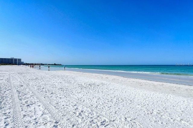 1036 W Peppertree Ln Unit 113B, Sarasota, FL 34242 - water view featuring nearby beach