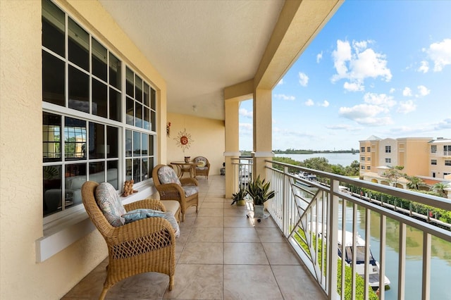 14041 Bellagio Way Unit 414, Osprey, FL 34229 - balcony featuring a water view