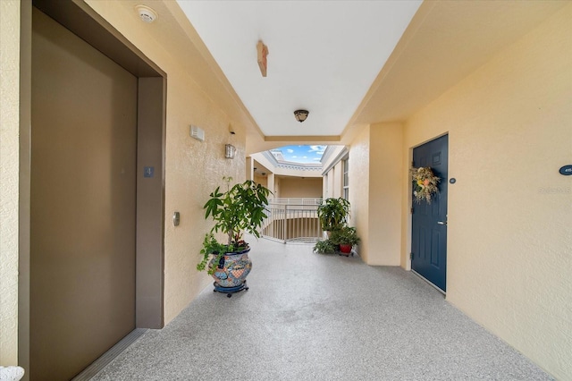 14041 Bellagio Way Unit 414, Osprey, FL 34229 - property entrance featuring elevator and stucco siding