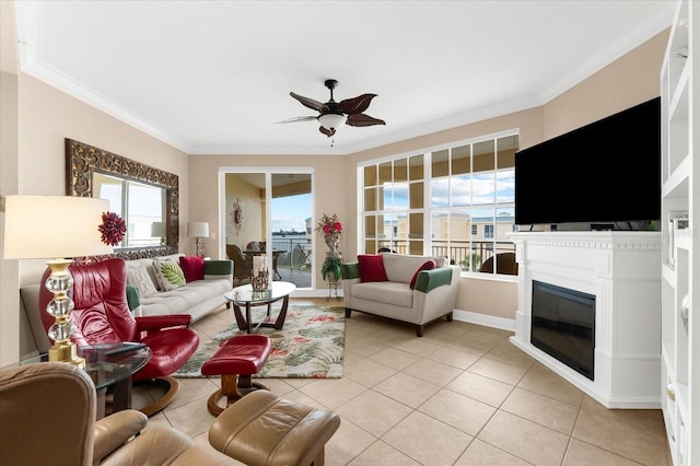 14041 Bellagio Way Unit 414, Osprey, FL 34229 - living room with ceiling fan, crown molding, light tile patterned flooring, and a glass covered fireplace