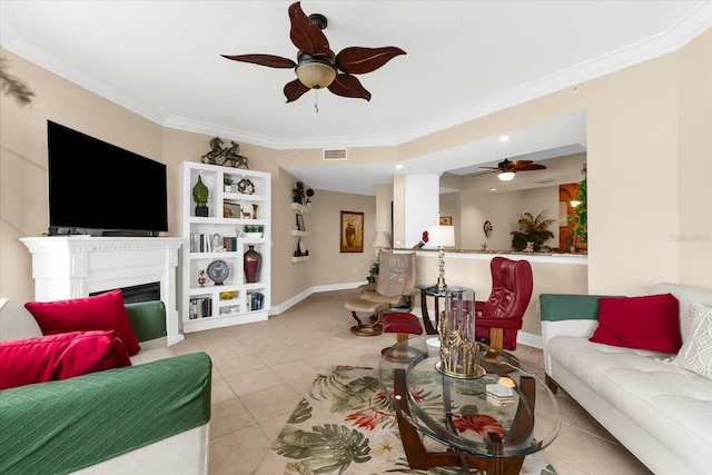 14041 Bellagio Way Unit 414, Osprey, FL 34229 - tiled living area with ceiling fan, ornamental molding, and a fireplace