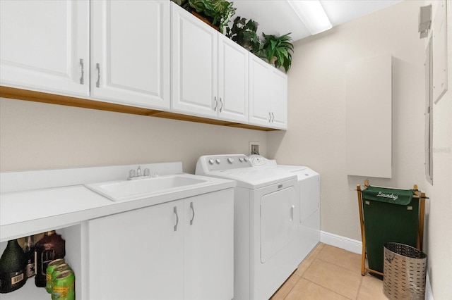 14041 Bellagio Way Unit 414, Osprey, FL 34229 - washroom featuring cabinet space, independent washer and dryer, and light tile patterned floors