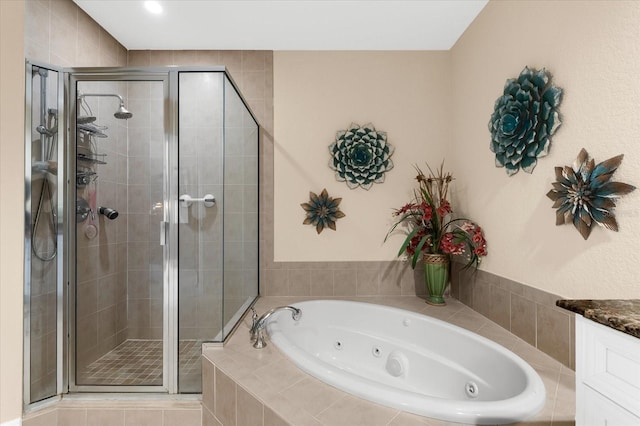 14041 Bellagio Way Unit 414, Osprey, FL 34229 - bathroom featuring a jetted tub and a stall shower