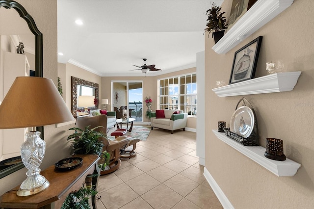 14041 Bellagio Way Unit 414, Osprey, FL 34229 - living area featuring light tile patterned flooring, crown molding, ceiling fan, and recessed lighting