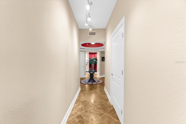 14041 Bellagio Way Unit 414, Osprey, FL 34229 - hall featuring track lighting and tile patterned flooring