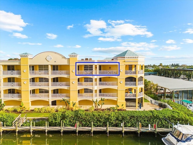 14041 Bellagio Way Unit 414, Osprey, FL 34229 - view of building exterior with a water view
