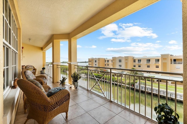 14041 Bellagio Way Unit 414, Osprey, FL 34229 - balcony featuring a water view