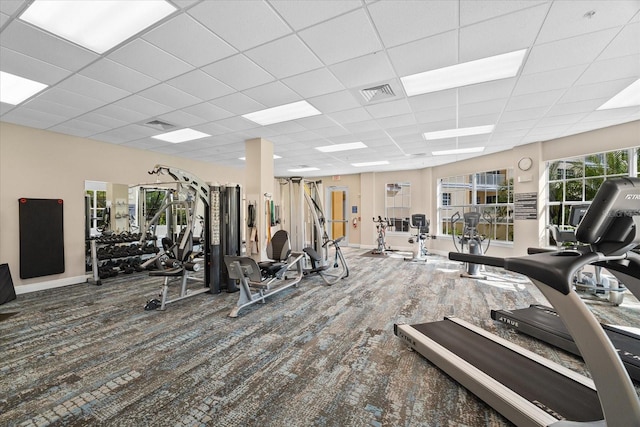 14041 Bellagio Way Unit 414, Osprey, FL 34229 - gym with a paneled ceiling and carpet floors