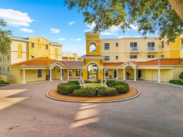 14041 Bellagio Way Unit 414, Osprey, FL 34229 - view of building exterior with curved driveway