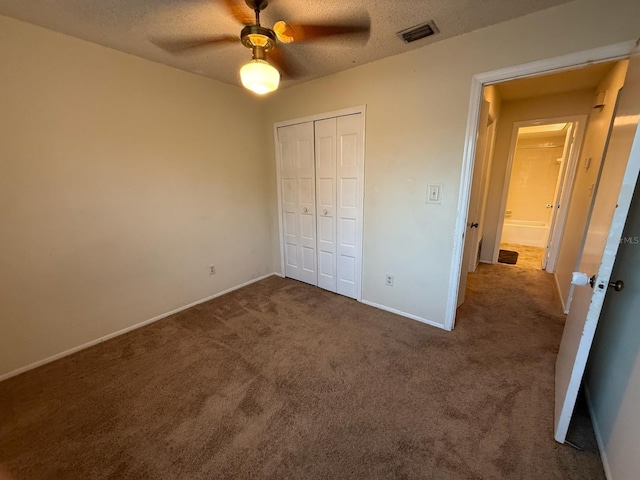 1264 Village Way, Orlando, FL 32807 - unfurnished bedroom featuring a closet, carpet flooring, a textured ceiling, and ceiling fan