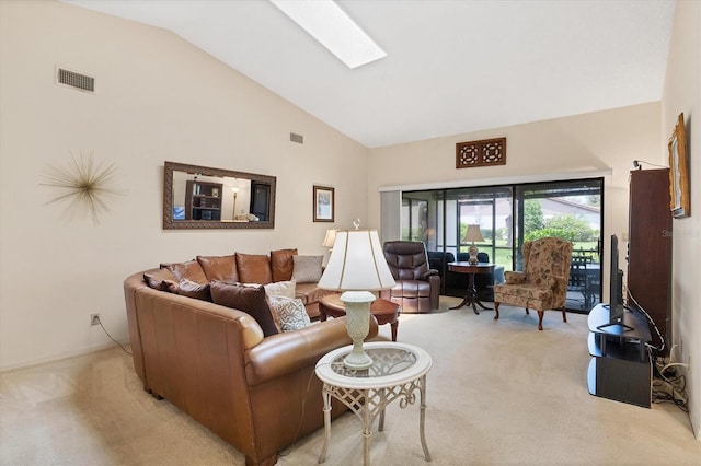 4001 Wilshire Cir E Unit 72, Sarasota, FL 34238 - living room with light carpet and high vaulted ceiling