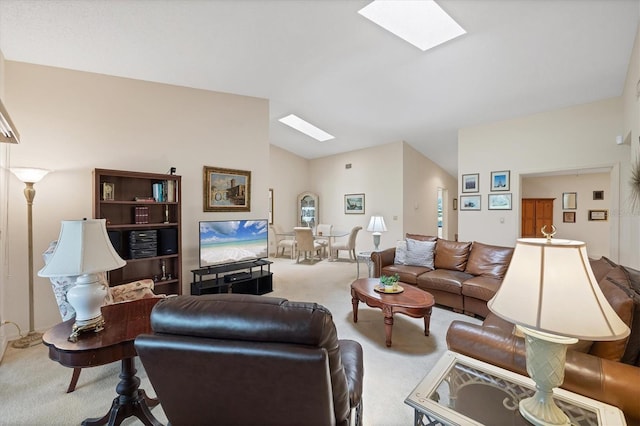 4001 Wilshire Cir E Unit 72, Sarasota, FL 34238 - living room featuring a skylight, carpet floors, and vaulted ceiling