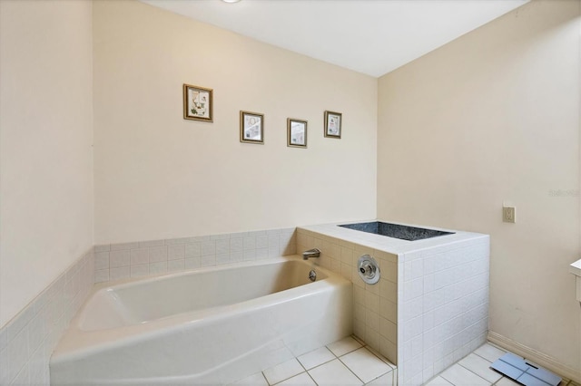 4001 Wilshire Cir E Unit 72, Sarasota, FL 34238 - bathroom with a garden tub and tile patterned floors