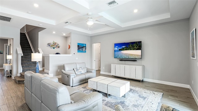 3431 Chestertown Loop, Bradenton, FL 34211 - living area with coffered ceiling, ceiling fan, stairway, wood finished floors, and beam ceiling