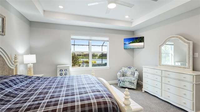 3431 Chestertown Loop, Bradenton, FL 34211 - bedroom featuring multiple windows, carpet, a tray ceiling, and recessed lighting