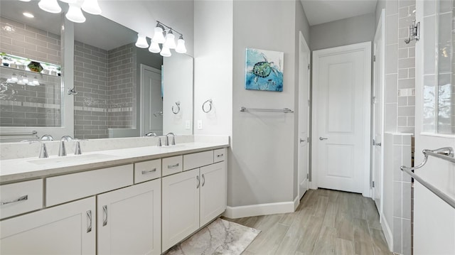 3431 Chestertown Loop, Bradenton, FL 34211 - full bath featuring double vanity, wood finished floors, and tiled shower