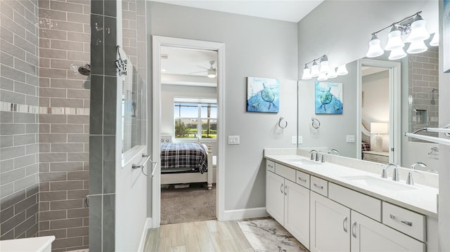 3431 Chestertown Loop, Bradenton, FL 34211 - bathroom featuring ensuite bathroom, double vanity, tiled shower, and a ceiling fan