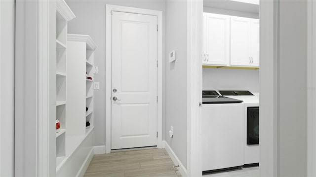 3431 Chestertown Loop, Bradenton, FL 34211 - laundry room with washer and clothes dryer, cabinet space, and light wood finished floors