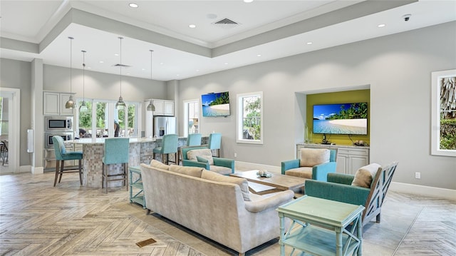 3431 Chestertown Loop, Bradenton, FL 34211 - living area featuring recessed lighting, a towering ceiling, and ornamental molding